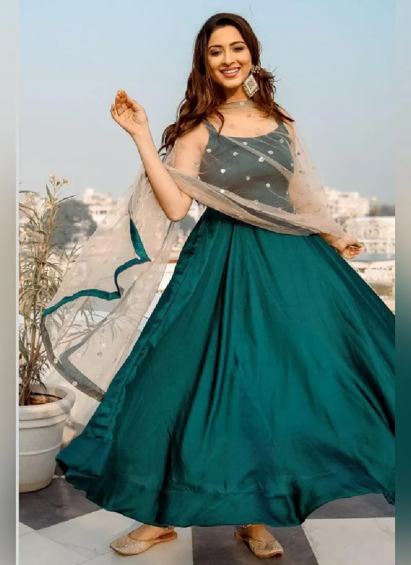 Glamorous Turquoise Color Silk Base Anarkali Suit