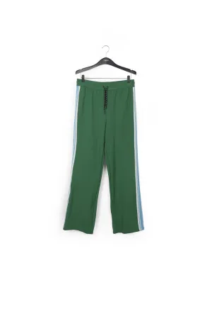 Green track pants with blue and off-white stripes